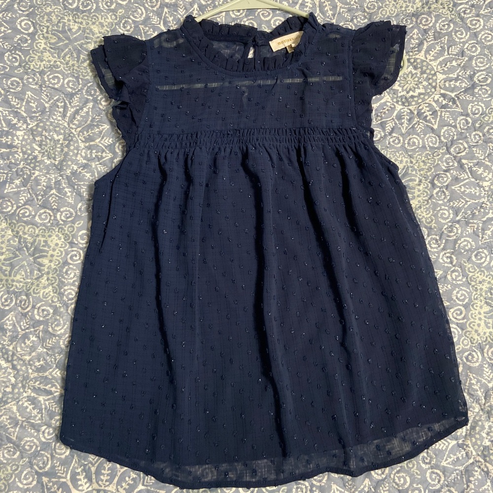 Monteau Los Angeles sleeveless blouse.